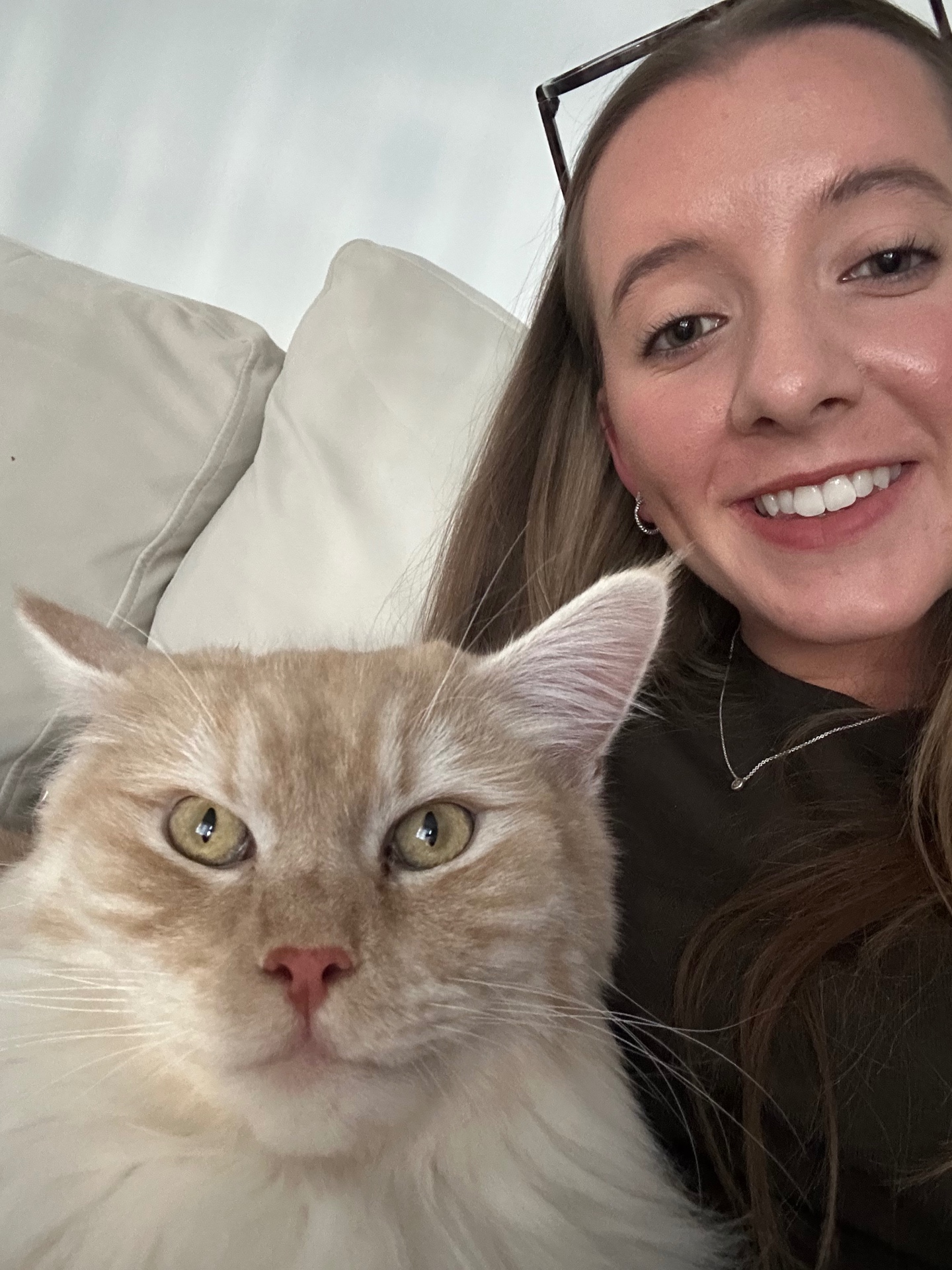 Grace, owner of Grace's Pet Sitting, with a pet